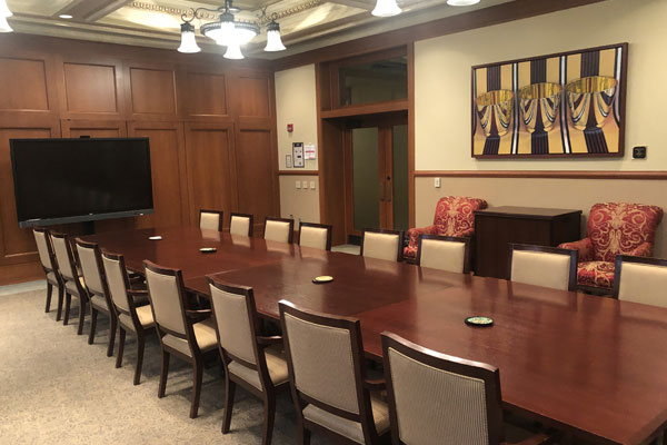 Room 203 meeting in progress