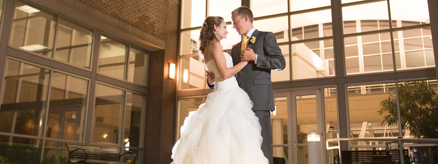 Bride and groom on NIU Naperville patio